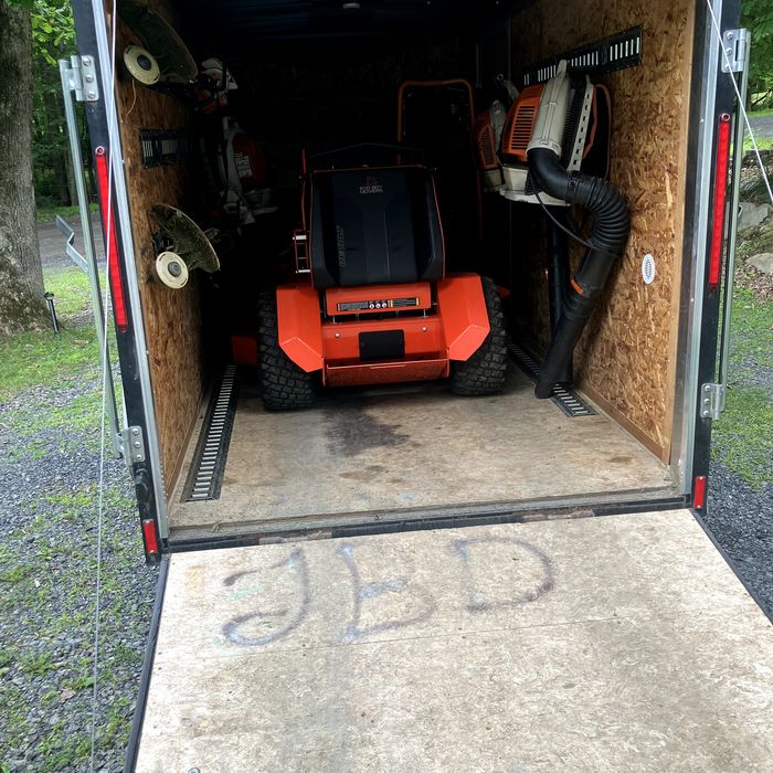 Equipment trailer loaded and ready for the route